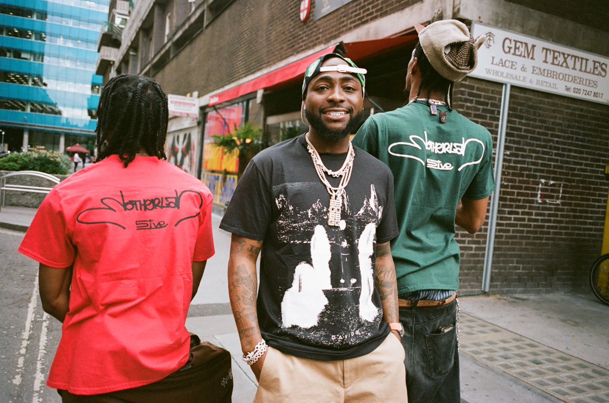 davido's tweet photo. DAVIDO x MOTHERLAN
TEES OUT NOW 5️⃣ 

https://t.co/nU2a89lk1O https://t.co/hvFd2xoN8O