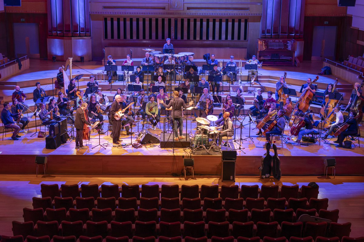 Guitarist Bill Frisell released the GRAMMY-nominated “Orchestras” one year ago today featuring the guitarist’s trio with Thomas Morgan &amp; Rudy Royston performing arrangements by Michael Gibbs with both the Brussels Philharmonic &amp; Umbria Jazz Orchestra: billfrisell.lnk.to/Orchestras