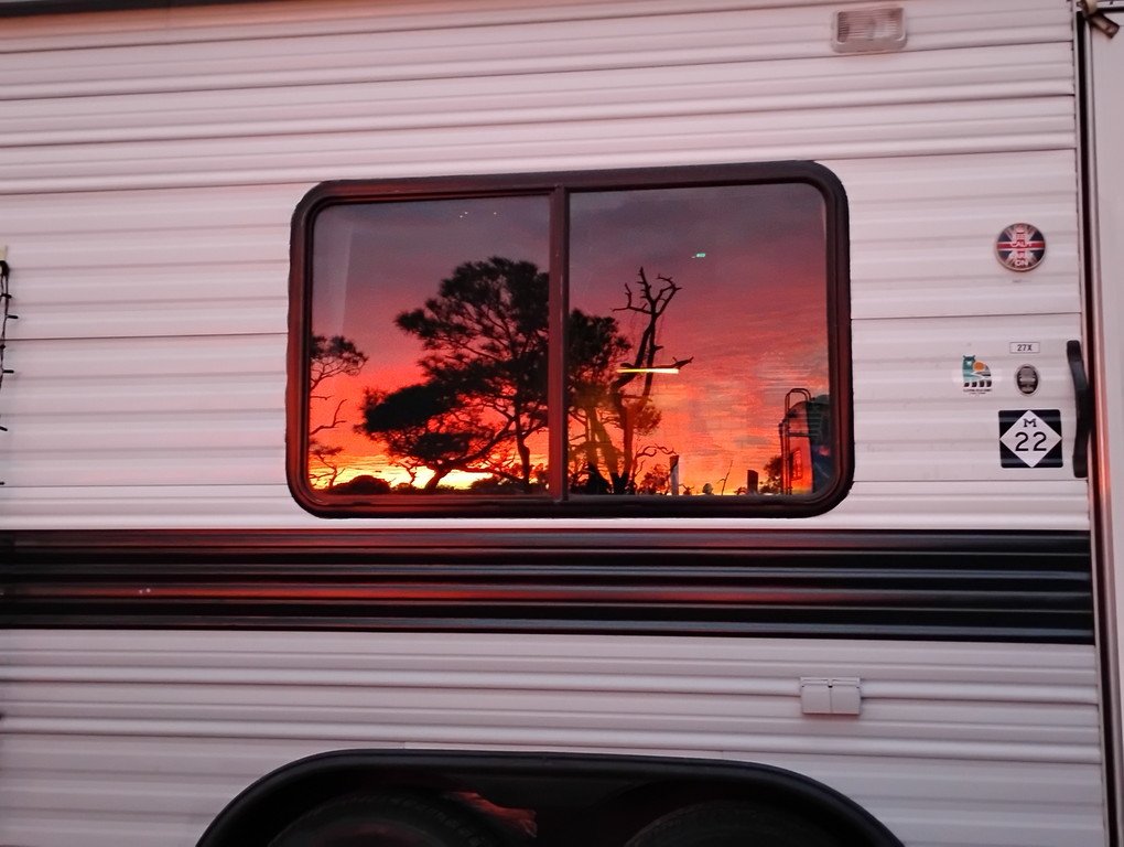 FlamencoCaravan's tweet photo. @weatherchannel State Park on St. George Island, FL 
Reflection in camper window https://t.co/EQXwgjy69E