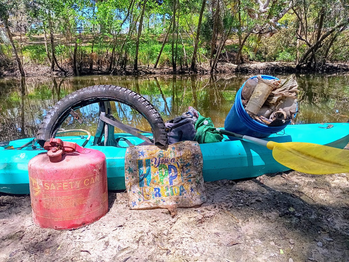 TJRPitt's tweet image. A quick paddle today up a stream that empties into Clearwater's Stevenson Creek, hauled in a full bucket of #Litter(mostly plastic) + a large 'Safety Can', half a bike tire, and a 'Happy Birthday' balloon on my brother's birthday...what are the chances?!🥳