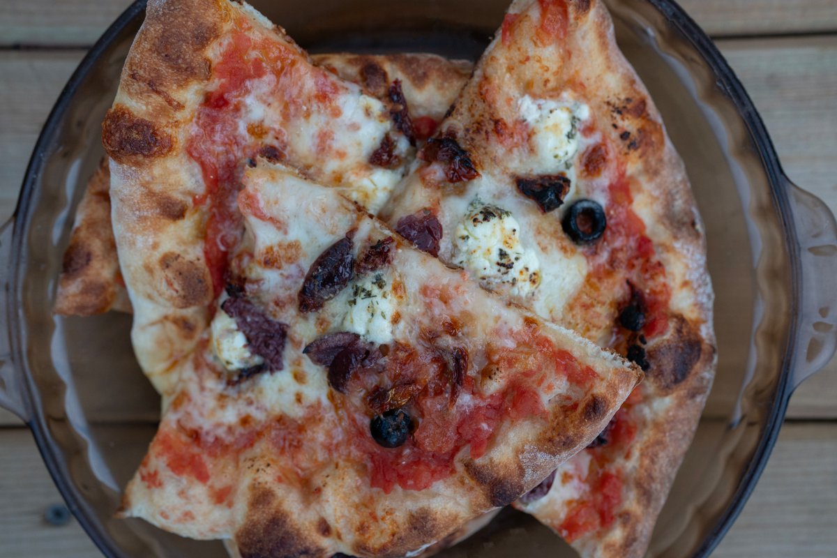 Leftover show-and-tell: goat cheese, mozzarella, black olives, and sun-dried tomato pizza.  👌

Do feel free to boast heartily of thy evening repast.