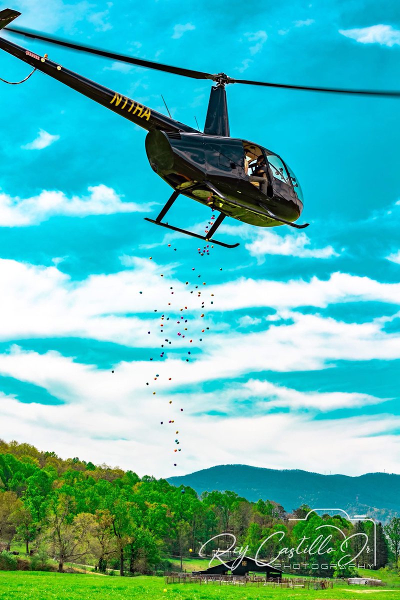 Greg Biffle returned to Black Mountain today in his R44 helicopter, bringing with him a special guest—the Easter Bunny. In a delightful surprise for local children, the Easter Bunny took to the skies and delivered Easter eggs from the helicopter. It was a memorable day filled