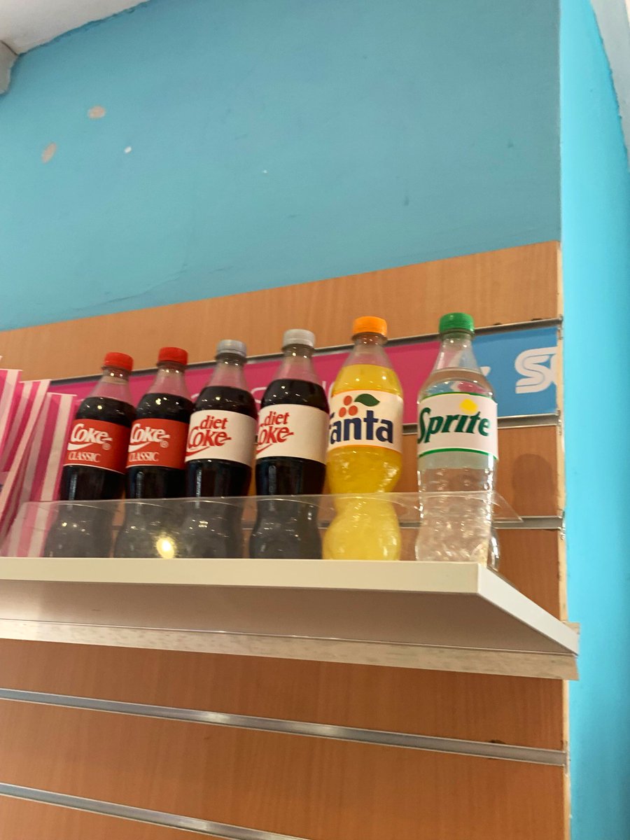 zachariahassler's tweet photo. Now that’s how you build hype for a scare maze . Who remembers in 2021 when Thorpe were advertising there new for 2021 scare maze Trailers. They opened this Superspark shop all dressed up like the 80s with branded pop too.🥤#trailers #halloween #SpookySzn #boo #retro #eightys https://t.co/6yW7oVpP8f