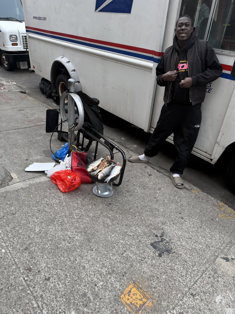 Casey's tweet photo. saw a guy on Canal Street grilling 4 whole fish.  he was so psyched. https://t.co/EOlEfbZhUs