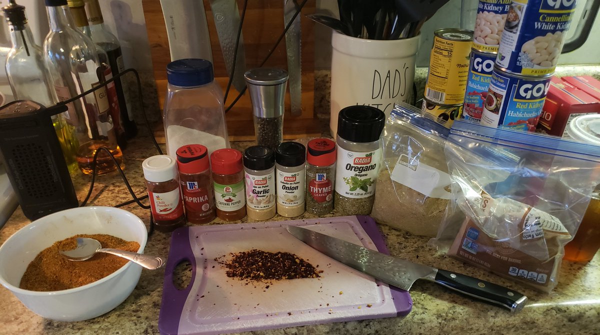 In the lab concocting a rib rub for tomorrow's #Easter #dinner. All to taste until I get it right. Big salute to my Pops for sending me some of his homemade dehydrated peppers seasoning (in bag next to oregano.) That's a big part of this. 😋