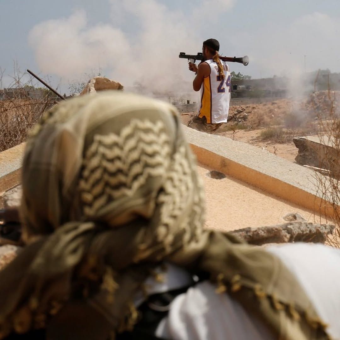 culturejpg's tweet photo. A libyan soldier fighting ISIS while dressed in a Kobe jersey https://t.co/3F15ZSV2Qw