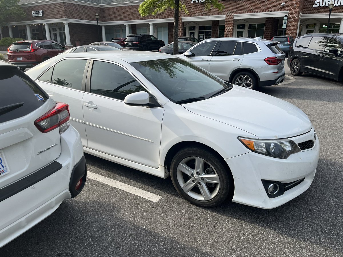 DavidModeel's tweet image. How do you park this poorly and just walk away thinking “close enough”?