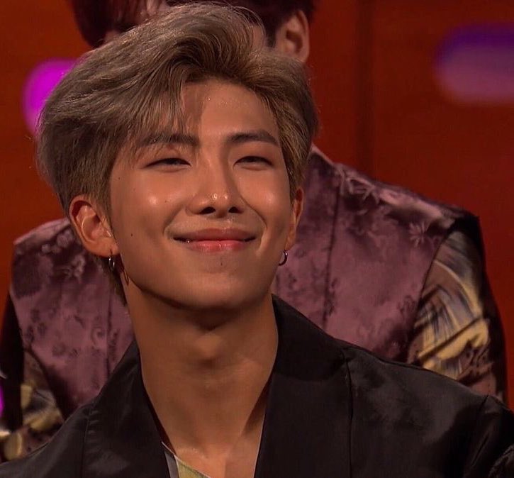 His honey like skin with that pretty smile