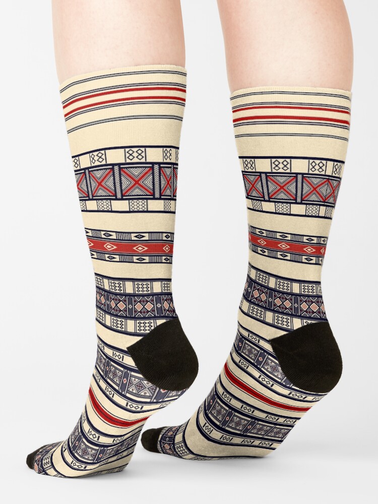 PDyaczenko's tweet image. Did you know the Fulbe people weave symbolic patterns into clothing to carry ancestral blessings? Step into tradition with these Traditional Fulbe Pattern: Wool Kaasa Design Socks. Get them at redbubble.com/i/socks/Tradit… #FulbeHeritage #KaasaDesign #PatternedSocks #CulturalWear