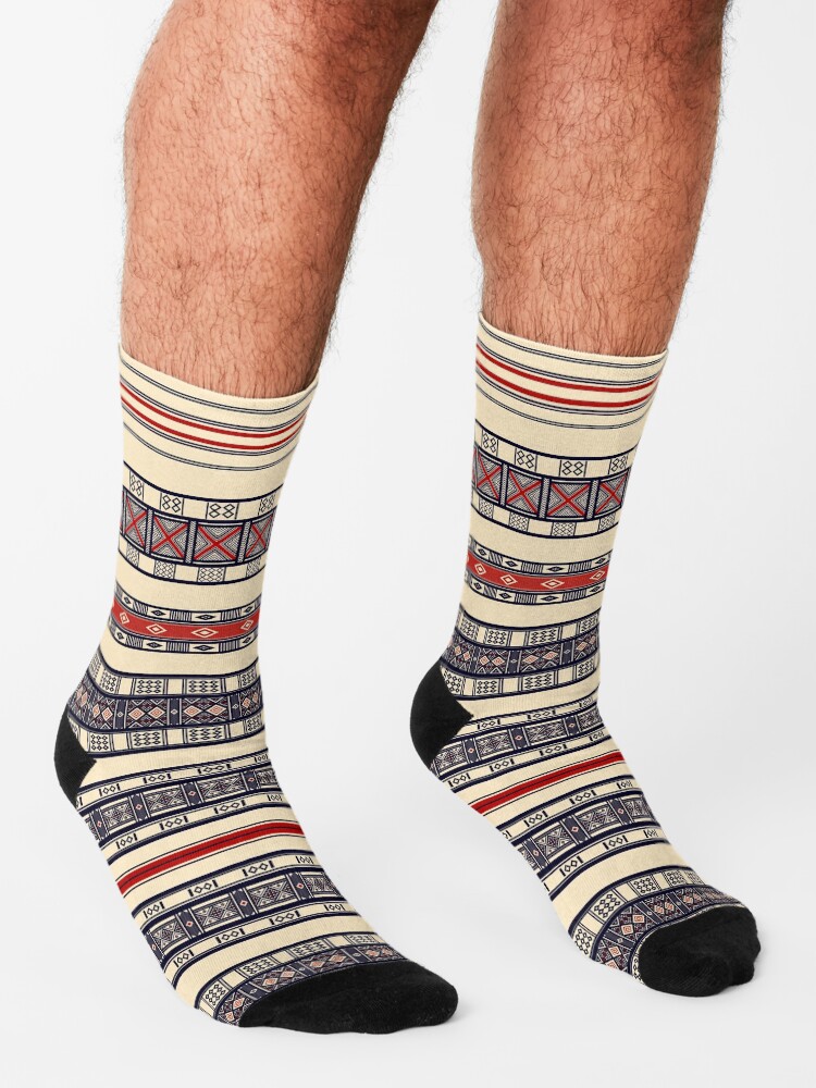 PDyaczenko's tweet image. Did you know the Fulbe people weave symbolic patterns into clothing to carry ancestral blessings? Step into tradition with these Traditional Fulbe Pattern: Wool Kaasa Design Socks. Get them at redbubble.com/i/socks/Tradit… #FulbeHeritage #KaasaDesign #PatternedSocks #CulturalWear