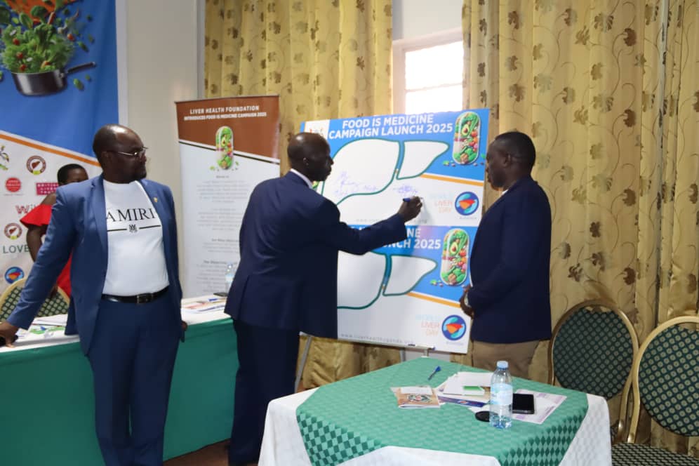 Commissioner of Police, Dr. Emanuel Nuwamanya and Deputy Director Police Health Services, commissioning food is Medicine Campaign in Uganda, " let's start with the Police"