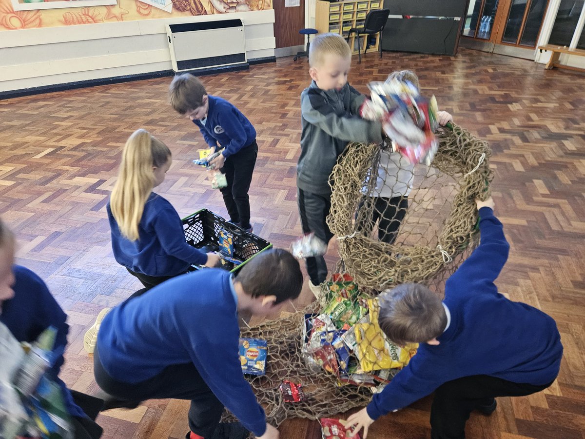 Global Ocean Trawler Challenge.We are collecting crisps and sweet wrappers to fill this huge trawler net to help keep rubbish out of our environment.The first 100 bags have been emptied into the net-but we need your help!@BritishIronwork <a href="/EcoSchoolsWales/">Eco-Schools Wales</a>
