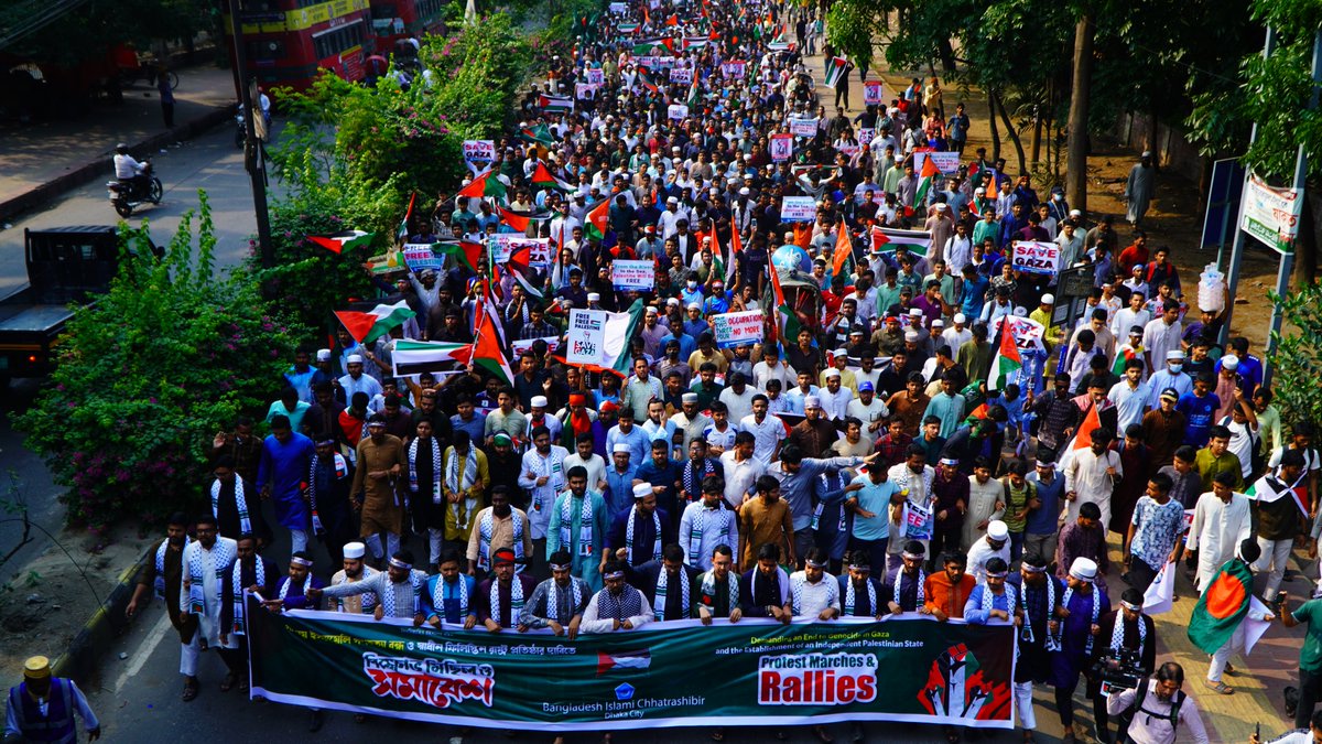 info_shibir's tweet photo. Chhatrashibir Holds Protest March in Capital Demanding End to Israeli Genocide in Gaza and Establishment of Independent Palestinian State

A protest march has been organized in the capital by Dhaka Metropolitan Chhatrashibir demanding an end to the Israeli genocide in Gaza and the establishment of an independent Palestinian state. Today (April 8) at 3 PM, the march begins from Shahbagh and proceeds through Matsya Bhaban and the National Press Club, concluding with a rally at the north gate of the National Mosque Baitul Mukarram.

The march is led by Nurul Islam Saddam, Secretary General of Islami Chhatrashibir, with the presence of Central Office Secretary Sibghatullah, Publicity Secretary Azizur Rahman Azad, International Affairs Secretary Mutasim Billah Shahedi, Student Rights Secretary Amirul Islam, Publications Secretary Abu shadik Kayem, along with other central leaders. In addition, thousands of leaders and activists, including presidents and secretaries from various universities and metropolitan branches in Dhaka, also join the march.

#Chhatrashibir #EchoesForGaza #GlobalStrikeForGaza #Bangladesh #GazaGenocide #GazaNeedsBread #GazaUnderAttack