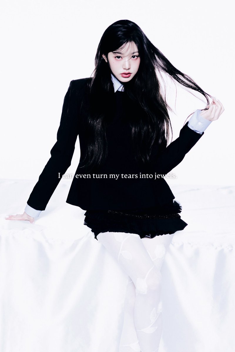 She’s   the   daughter   of   midnight,   weaving
threads  of  silk  and  steel   into  the  fabric  of 
her   own   legend—sharp   yet   soft,   delicate 
yet   deadly