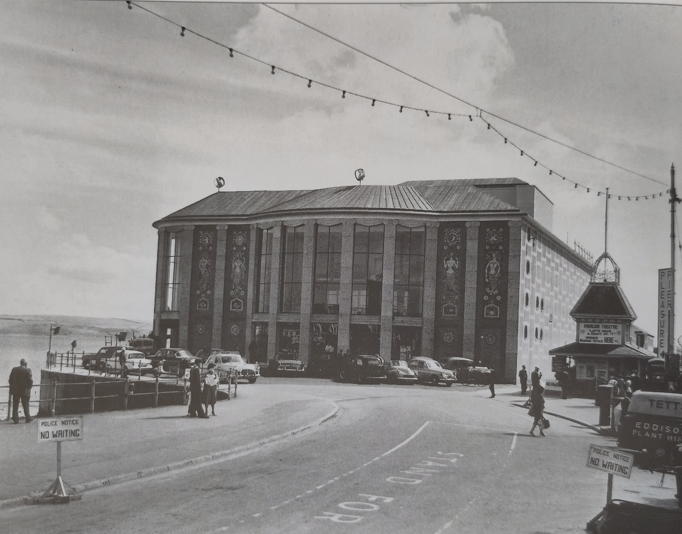 SeasideFerry's tweet photo. My book comes out a month today🥳 so it's high time I shared some of my favourite buildings from it. 
This is #Weymouth Pavilion, opened July 1960. Designed by Verity and Beverley it's in a sort of pebble-dashed mid-century seaside Georgian style with a bow front https://t.co/rEsQrojDBT