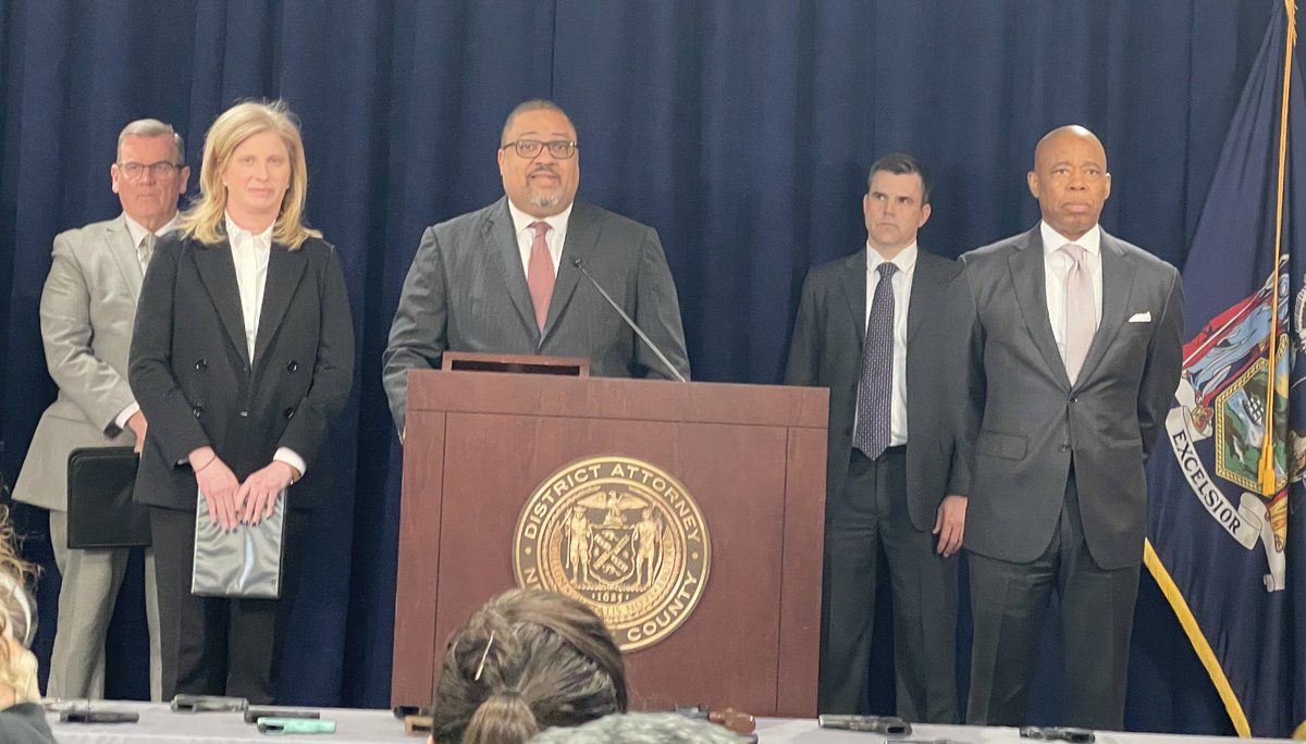 Manhattan DA Alvin Bragg alongside Eric Adams and NYPD Commissioner announcing the indictment of 16 individuals who allegedly committed 21 different shootings over several months in Harlem last year.