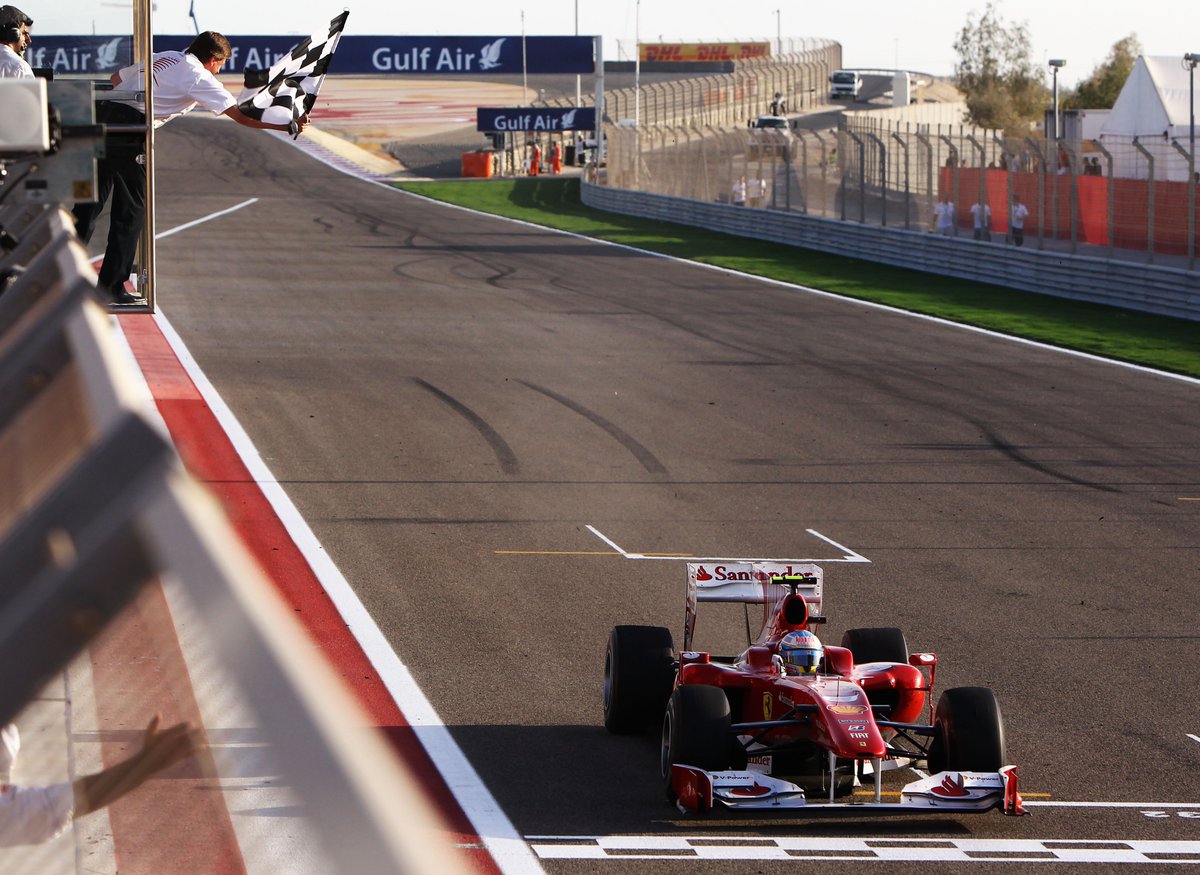 F1's tweet photo. The first win in red is always special! 🤩

Alonso took his first win at Ferrari at Bahrain in 2010 ⏪

#F1 #BahrainGP https://t.co/8uTHqIziNH