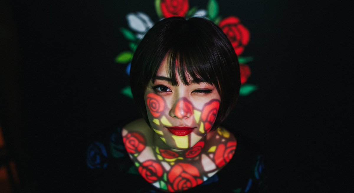 Dd41Giant's tweet photo. #Imagefx #Promptshare
Overhead shot Extremely grainy low quality photo taken with leicaM2 using color film at iso800. Realistic depth of field Bokeh effect Beautiful shadows Artistic composition A very beautiful Japanese movie actress with short hair and red lips wearing a black shirt. Only her breasts and shoulders are visible, the rest is hidden by soft focus. Her expression is winking and smiling, and she is photographed from the front with a symmetrical colorful rose stained glass projection mapping projection. The background is a black wall, in contrast to the woman's figure. The lighting is soft and diffused, creating a moody, ethereal atmosphere. The image is smooth with high contrast, deep blacks and bright whites, and no rough lines or textures. The overall effect is soft-focus and slightly ghostly.