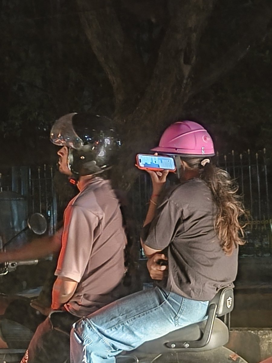 If you hold your phone like this as a pillion... You are inviting someone to snatch it away.

#Bangalore