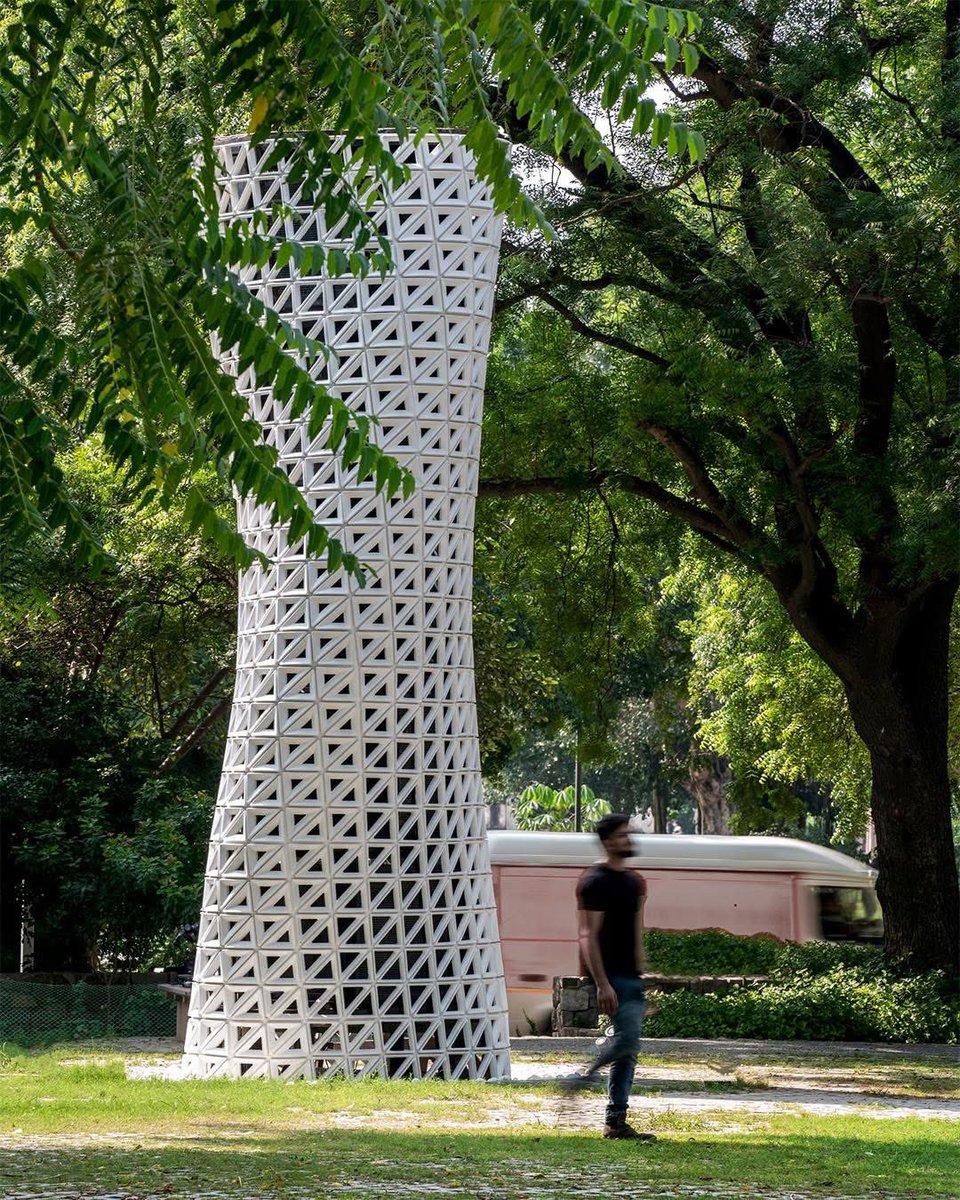 parametricarch's tweet photo. VERTO, created by Studio-Symbiosis Architects, is an air purification tower designed to maximize surface area, increase wind speed, and provide 360-degree air purification, located in New Delhi. The tower rotates as it rises and transforms polluted air into clean air, effectively improving the environment.

The triangular perforations are designed as a performance-driven system, with larger openings at the inlets and outlets. The ambient air is drawn in by energy-efficient fans and then filtered using fine dust filters to eliminate pollutants. An IoT control system allows for operation based on demand. 

📸 Avesh Gaur

#parametricarchitecture #parametricdesign #vertoair #sustainability #india