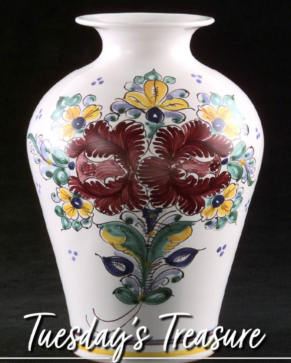 This week's Tuesday Treasure is a ceramic vase donated by President Michael Kovac of Slovakia to the Buffalo Bill Historical Center. It features a flared neck, a white background with maroon and yellow flowers, and decorative blue and brown bands. #codywyoming #tuesdaytreasure