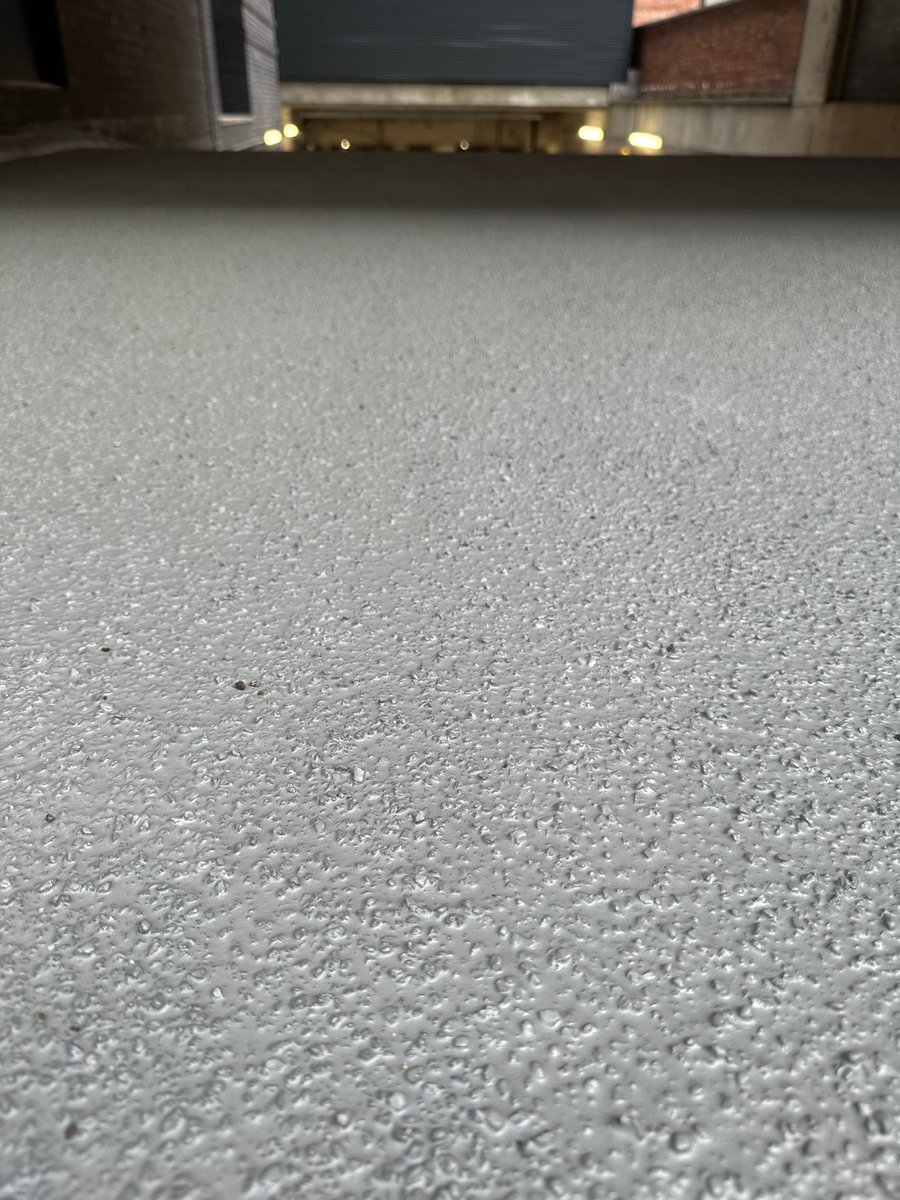 ConrenResin's tweet photo. The issue.... a slippery ramp that was allowing water to ingress to the car park spaces below🚗! With its long track record Flowcretes #DeckshieldEDRamp was the obvious choice. This specification incorporates 1-3mm Bauxite, providing excellent slip &amp; abrasion resistance. https://t.co/YCqiSHUjur