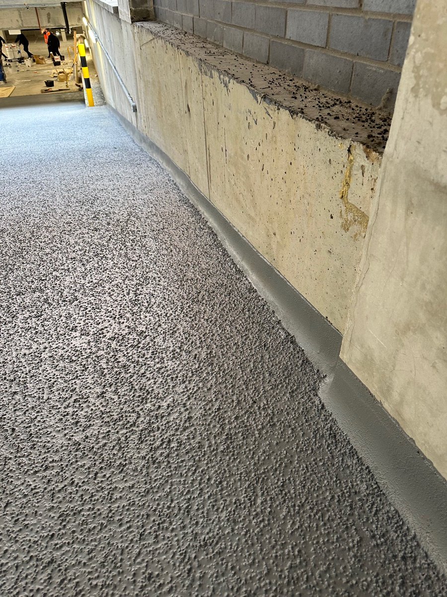 ConrenResin's tweet photo. The issue.... a slippery ramp that was allowing water to ingress to the car park spaces below🚗! With its long track record Flowcretes #DeckshieldEDRamp was the obvious choice. This specification incorporates 1-3mm Bauxite, providing excellent slip &amp; abrasion resistance. https://t.co/YCqiSHUjur
