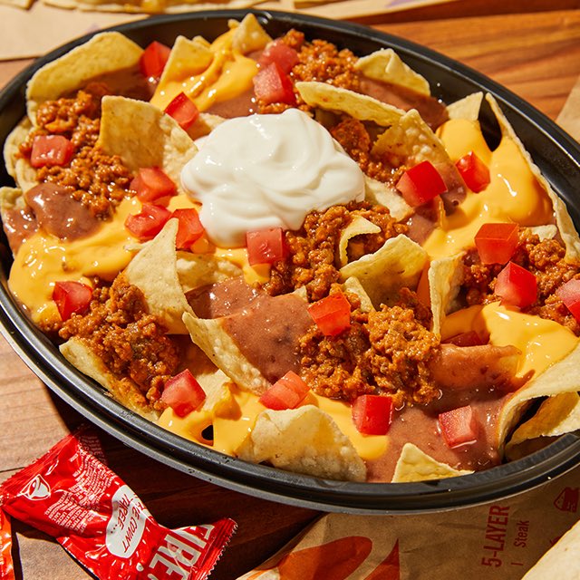 garyanddino's tweet photo. DINO’s FAST-FOOD NEWS:

@TacoBell $1 Nachos BellGrande

Dropping at 2‌ PM PT / 5 PM ET for #TuesdayDrops

A $1 Nachos BellGrande drops today at 2‌ PM PT / 5 PM ET. But hurry, you've got to be among the first 30k Rewards Members to click 'Claim Reward' on the drops page. https://t.co/r07Tmtzi8U
