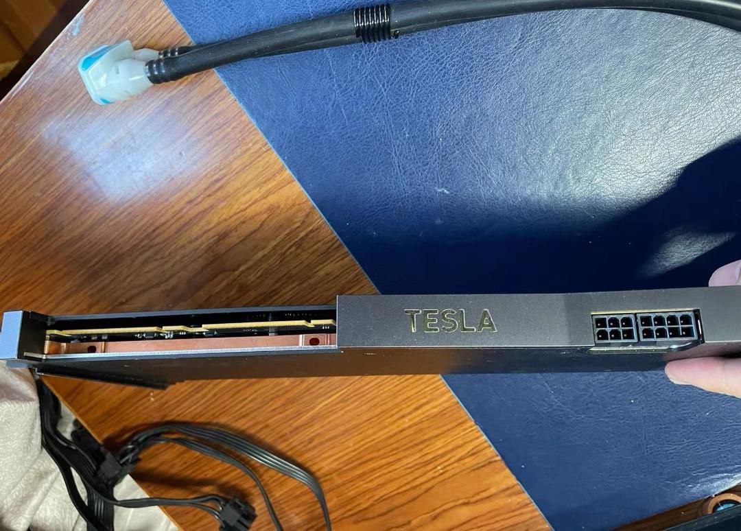 So, I decided to run an interesting AI model.

Luckily, I had this little toy from NVIDIA lying around — the DGX Station.
But, of course, one of the GPUs had to die on me.

For those unfamiliar:
It comes with 4 Tesla V100s connected via NVLink 2.0
These are custom-built GPUs,