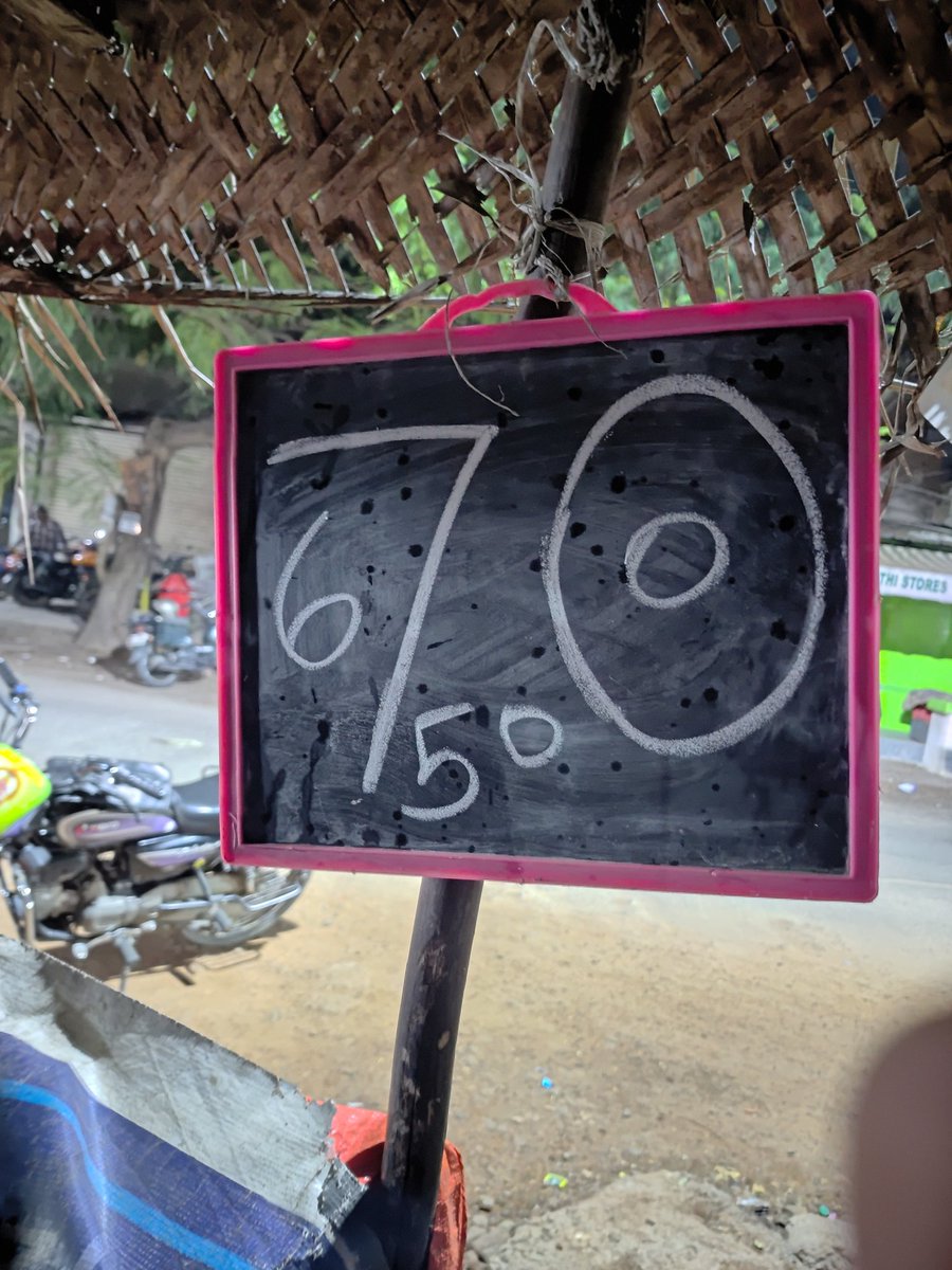 Alokdevrani's tweet photo. The smartest (and obviously the most confusing) price list on a coconut vendor’s cart:

Is it 🤔🤔 ₹60, ₹70, ₹50, ₹67, ₹675, ₹6750, ₹67,500, ₹6,75,000, ₹75, ₹75, ₹750, ₹7500
Guess the price and win a coconut!!!
Good luck decoding!
🌴🥥😂 https://t.co/Hbm6dYv3iw