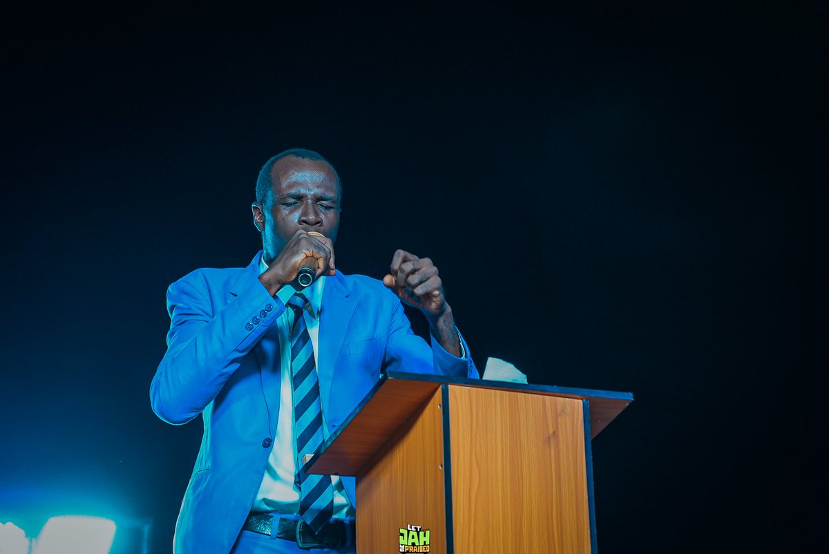JGM_Nation's tweet photo. A vessel of revival, a voice of fire! 🔥 
Min. Peter Asemota delivering raw power and truth at JGM! 🙌 https://t.co/XuzS72l0sX