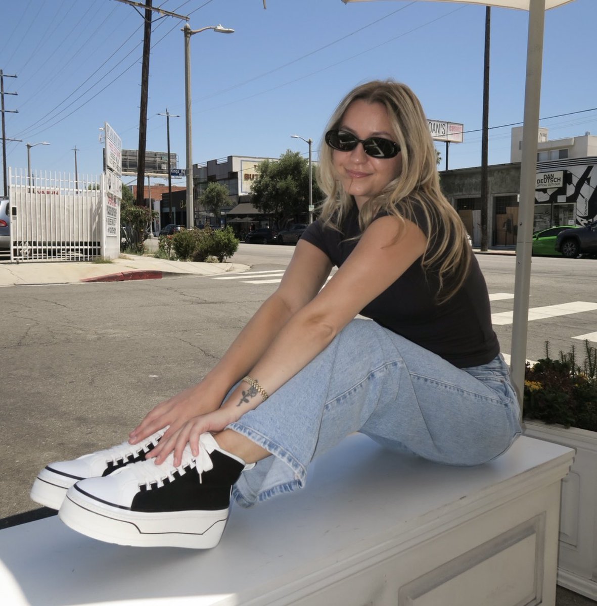 Caught between a coffee break and a street style moment 🤍  Shop the Eyekonn today!