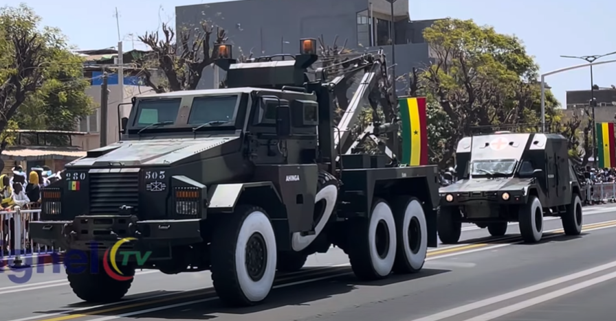 Rivet_Counter's tweet photo. Found some non-official footage of Senegal's 65th anniversary parade that gives a better view of a couple things that caught my eye: Gendarmerie Harrow Merkavas in the first pic and a Puma M36 MRAP recovery vehicle followed by a RAM ambulance of the army in the second pic https://t.co/IJzW9D4E43