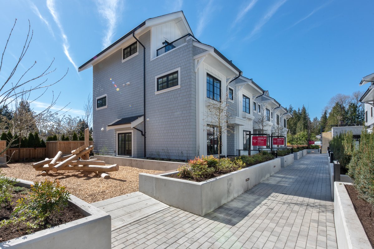 Incorporating natural elements into our communities whenever possible is a key focus of our Boffo team. Pictured here is our sold out Edgemont Village townhome project in North Vancouver that includes a wooden children's play structure.