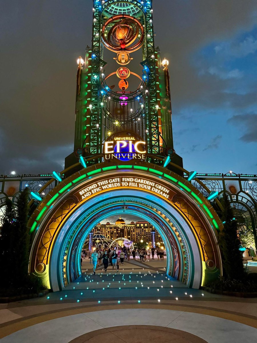 Zach Coddington on Facebook shared this gorgeous nighttime photo of the Universal Epic Universe portal entrance!

Simply stunning with the lights and Helios in the distance.