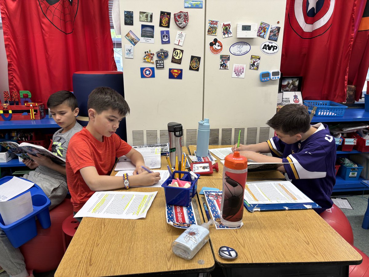 Literary essayists in #MVSRoom21 working to push their thinking to improve their writing about reading.