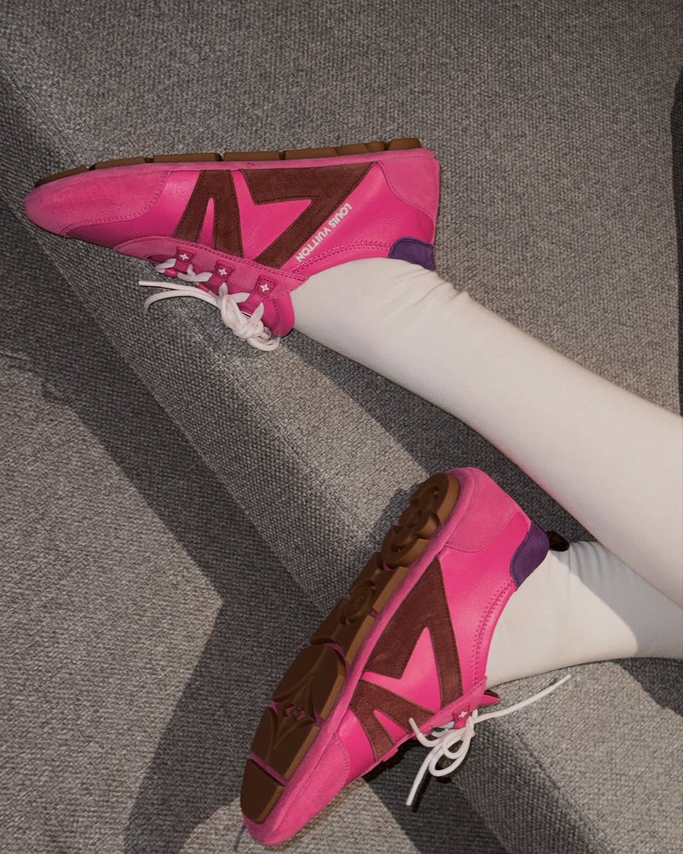 She lounges effortlessly, with that perfect mix of cute and bold, her outfit whispering confidence and rebellion all at once. Her legs? A runway. Her energy? Untouchable. And me? I'm the statement on her feet, the finishing touch to a look that doesn’t ask for attention.