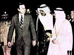 Red_Pill_US's tweet photo. Did you know that on September 11, 2001, as the horrific attacks unfolded, former President George H.W. Bush was attending a Carlyle Group event in Washington, D.C., alongside Shafiq bin Laden, the brother of Osama bin Laden? 

In a bizarre twist, just days later, while U.S. airspace remained locked down to the public, members of the Saudi elite—including several bin Laden family members—were granted rare permission to depart the country on specially arranged flights. 

I’m torn on whether these events are more peculiar than the FBI finding Saudi passports amid the Twin Towers rubble, while the planes’ black boxes mysteriously remained missing. 

What’s your take on this?