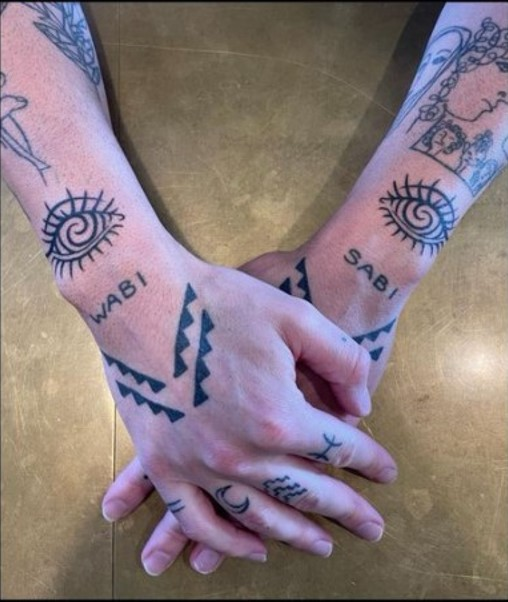 Awaken_Snorlax's tweet photo. He could of got a tattoo of a koru, but instead he got not one, but TWO spiral tattoos. #Doyle #Bussygalore https://t.co/xLkTyGWOEm