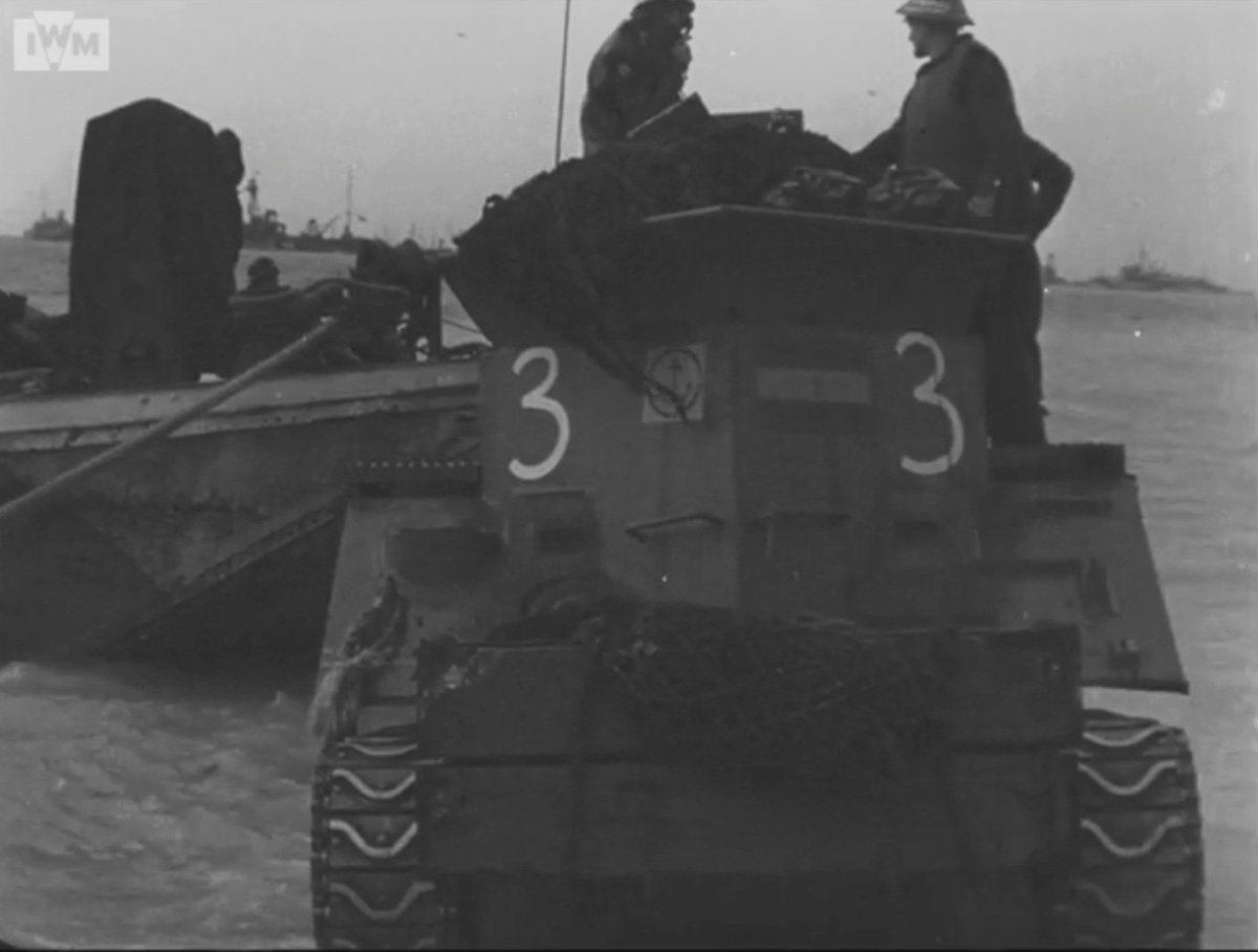 A Sherman BARV (beach armoured recovery vehicle) in service a few days after D-Day.
Around 60 M4A2s were converted in this manner and were used to keep the beaches unobstructed.
The "Spanish flag" on the side is actually blue, yellow and red, the colours of the REMEngineer Corps.