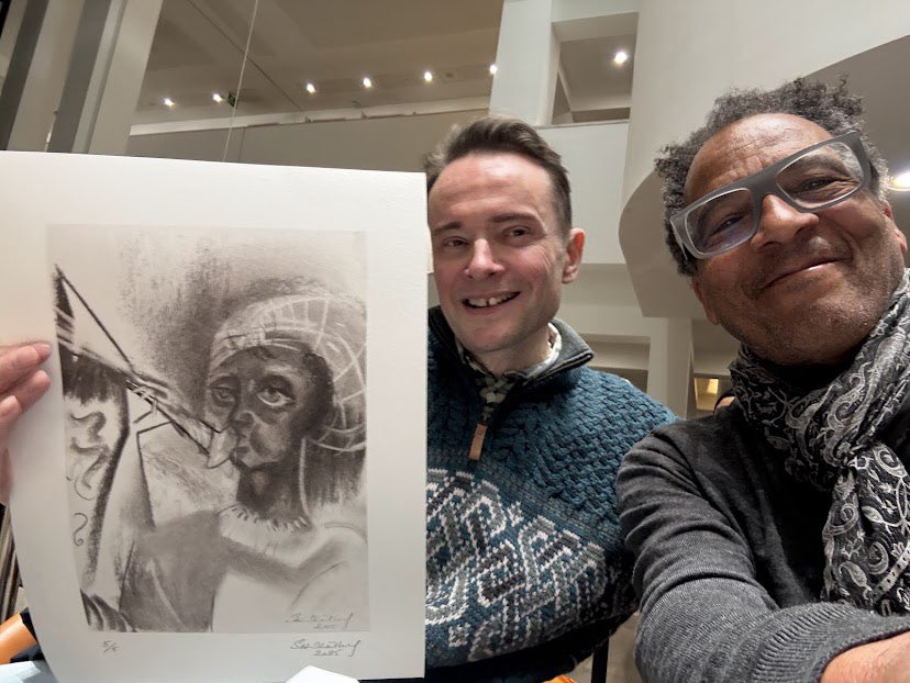 StephenBWhatley's tweet photo. A decade apart : with Tudor history’s ‘John Blanke’ (charcoal commission) at the British Museum in 2015; & on April 5, 2025, signing prints, published in new book ‘Who is John Blanke?’(Canbury Press) w/ author Michael I Ohajuru #books #artist #JohnBlanke https://t.co/KjKdacB67E