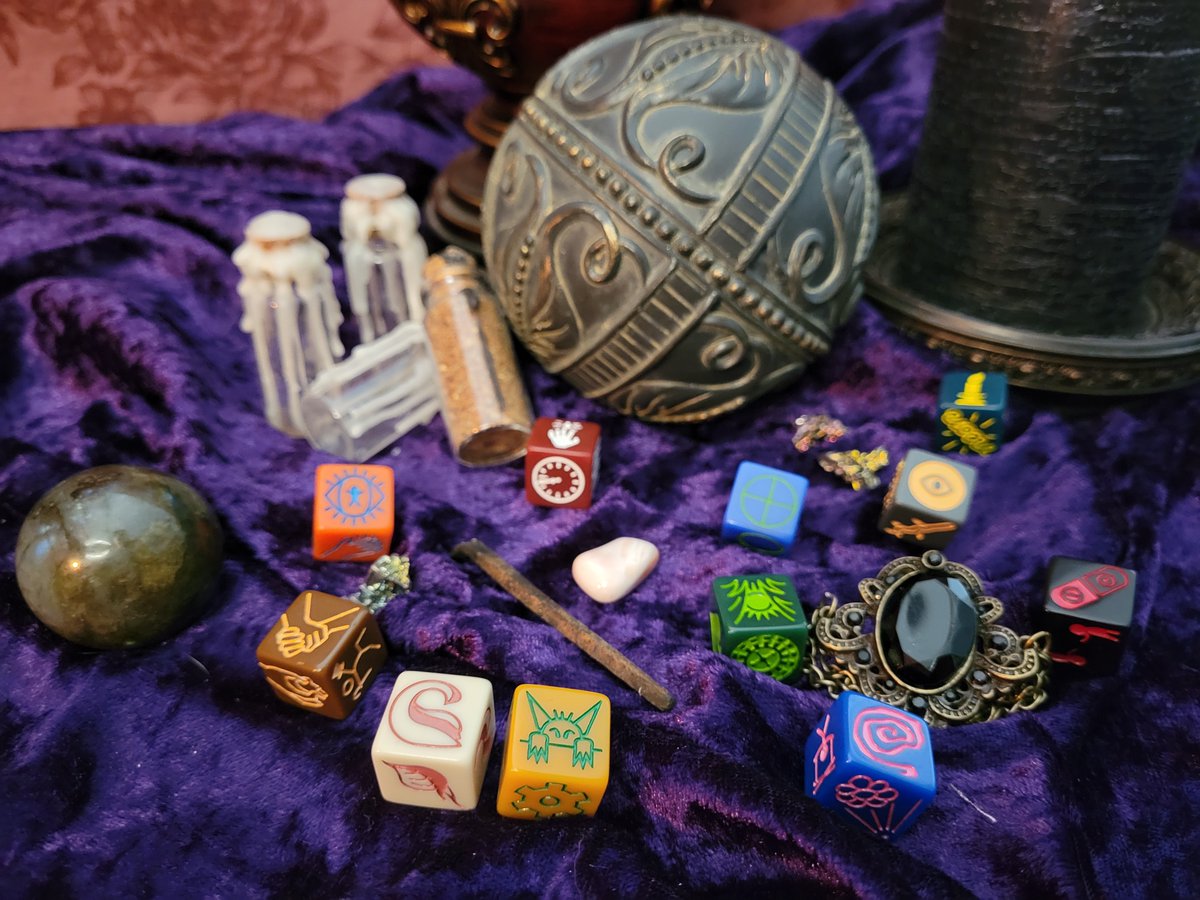 PublishGoblin's tweet photo. Dim the lights, light the candles, spread the cloth.
Now is the time for Fate to decide.

May 1st, the Oracle Dice return for their final edition. Two 22-dice sets, guides to learn with, cloths to cast over, and a chest to carry it all.

Will you join us?
https://t.co/iASNsqEa3Z https://t.co/MtzZwp9fwF