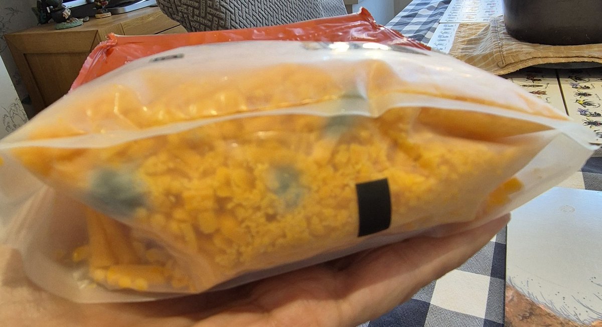 PinkFlip15's tweet photo. @Tesco really!!! Nothing like reaching for the unopened, in date cheese to have with your tea to find it like this 🤢🤮 #Tesco #mouldycheese #teasspoilt https://t.co/Wxo9I6A40F
