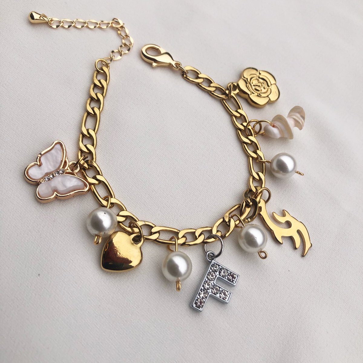 moladelagos's tweet photo. Gold charms bracelet 
N14,000 https://t.co/CbzCHjfXLz