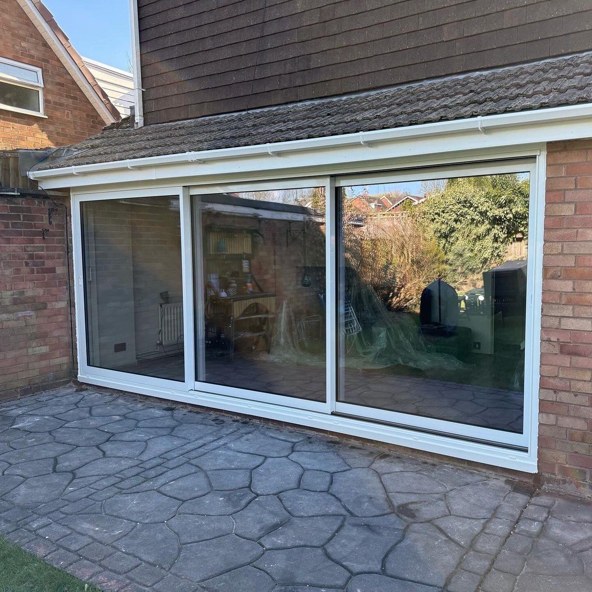 litehausuk's tweet photo. In March, we installed this stunning triple track @schueco_uk_ltd ASE60 slim line slide only door for our customer in Allesley, and carried out the removal of his existing PVC sliding doors to replace with 🆕. #Schuco https://t.co/H1tgM92phX