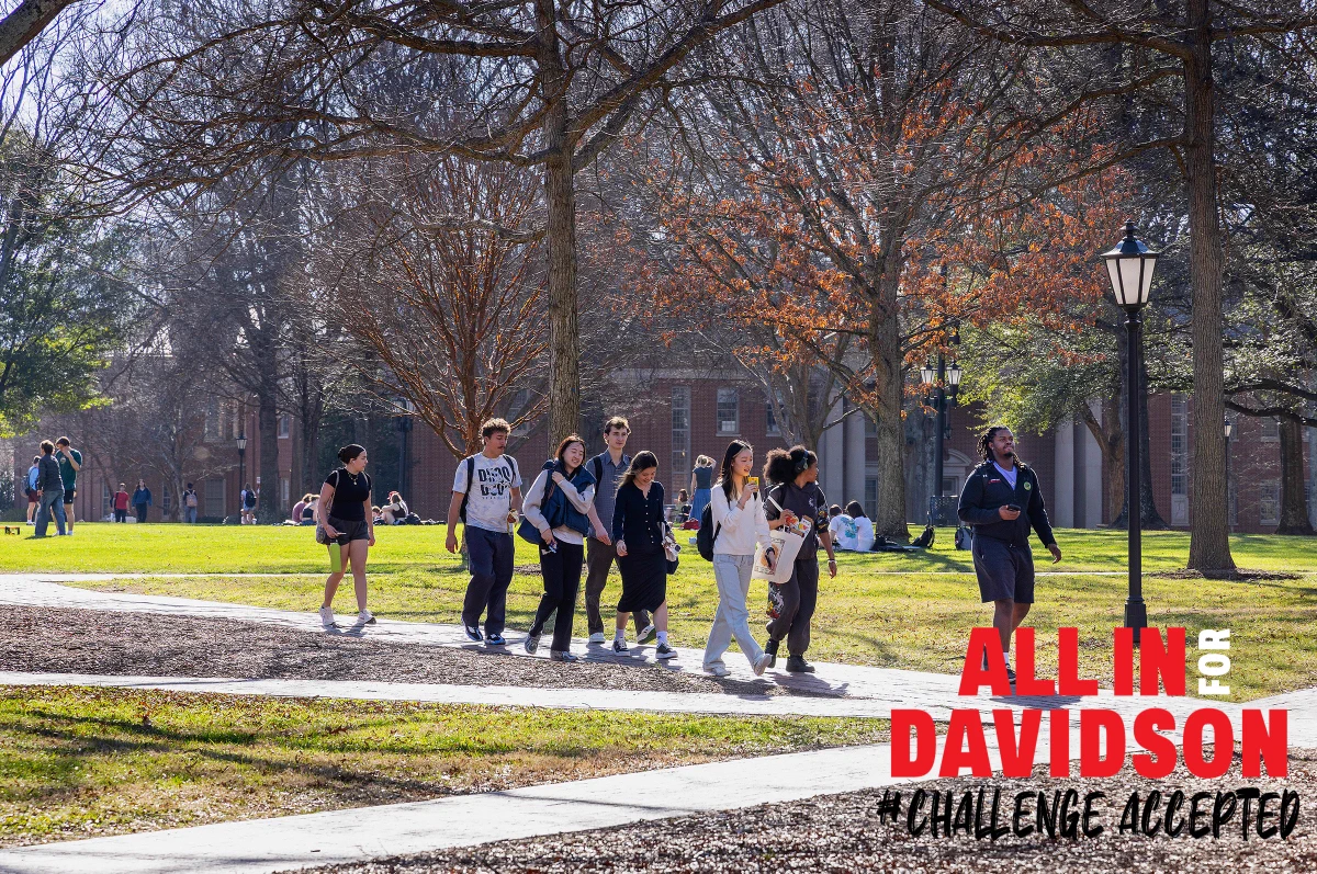 A photo of students walking across Davidson College's campus.