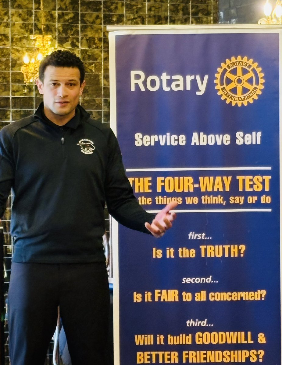 “Service above self…” Coach Calvin Simon proudly represented the #shakopeeschools community, @saberboyshockey and #saberalumni during his @shakopeerotary presentation yesterday afternoon. #saberpride #relationshipsmatter