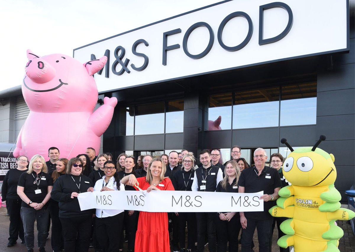 MandSnews's tweet photo. Ribbon cut, doors open! Our Cheltenham Centrum Retail Park store is open for business. 

Shelves are brimming with fresh produce, the Flower Shop is in full bloom and Click & Collect is up and running. Customers can visit the in-store bakery, enjoy barista-made coffee and browse the iconic M&S cheese barge. 

🗞️Read more in our latest release: https://t.co/IeQ1qZTfQq
#NotJustAnyNews #NotJustAnyStore