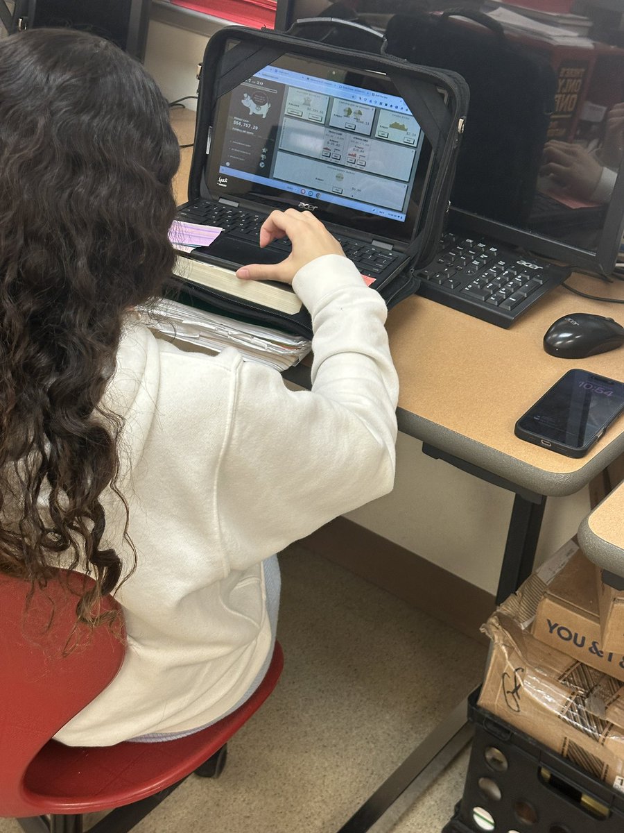 AngieAxman's tweet photo. #PACschools  Student completing an investment simulation.  Some cheering and some frustrations today. https://t.co/AEsGwa16oY