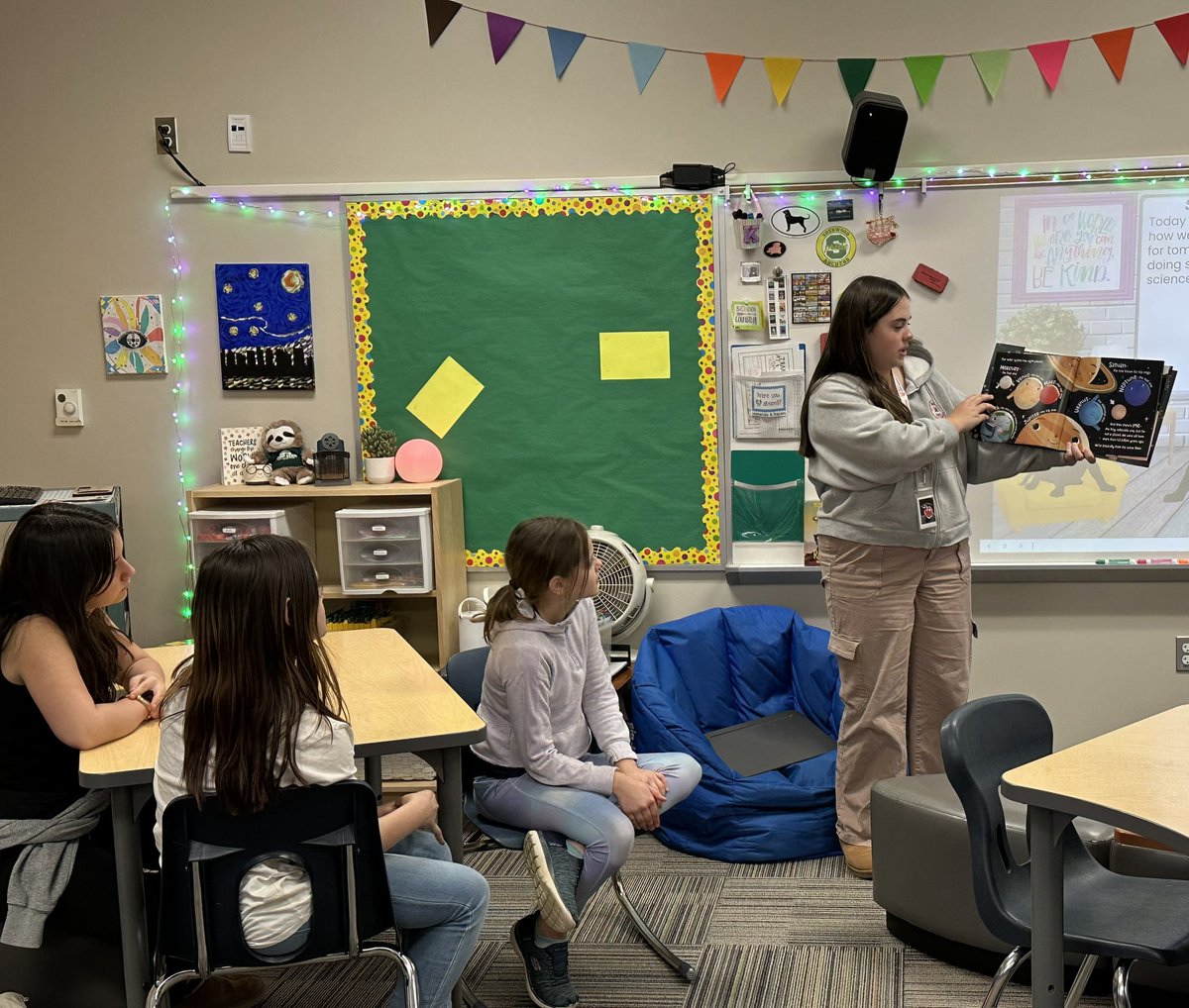 These Ss are enjoying a book being read to them by their awesome TA Gabby after a great 1st day of their science OST! <a href="/FHSchools/">FHSD</a>  <a href="/SherwoodArcher1/">Sherwood Archers</a> <a href="/TAcademyAHS/">AHS Teacher Academy</a>